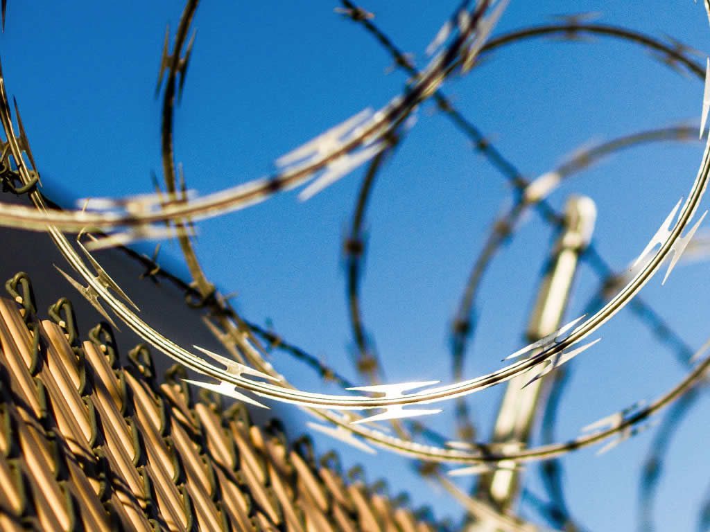 Razor Wire efficacy of fence toppings