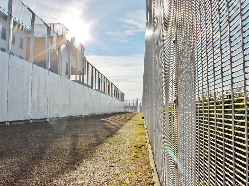 Prison Mesh Fences Women's prison fencing summertime security