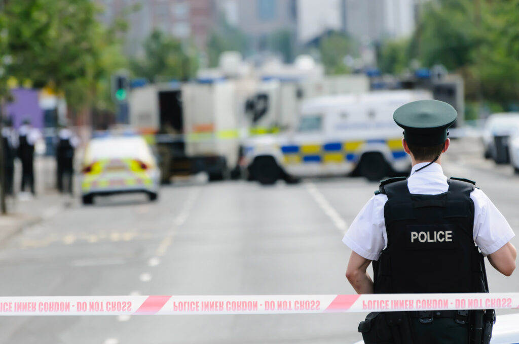 Police officers responding to a security incident demonstrating the importance of mission critical security and operational response.
